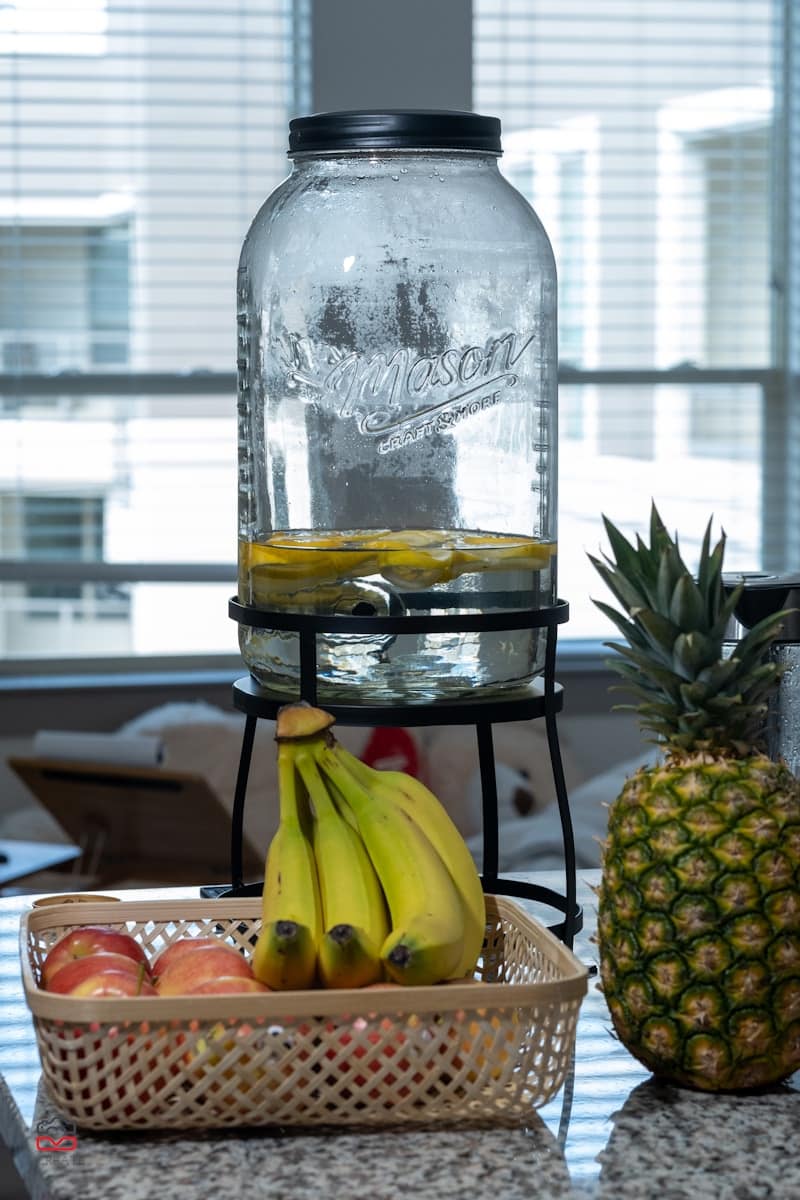 yellow banana fruit beside clear glass bottle - Water Matters