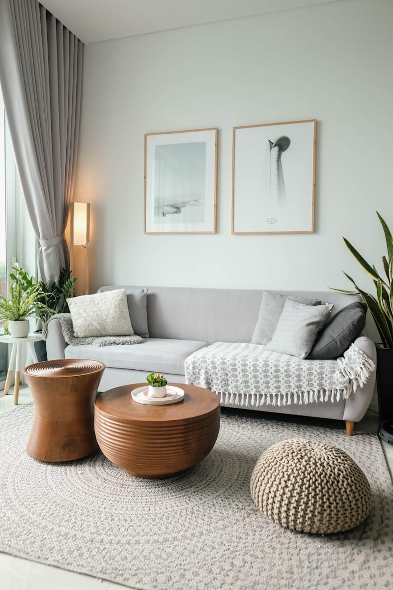 a living room filled with furniture and a large window- Air Quality